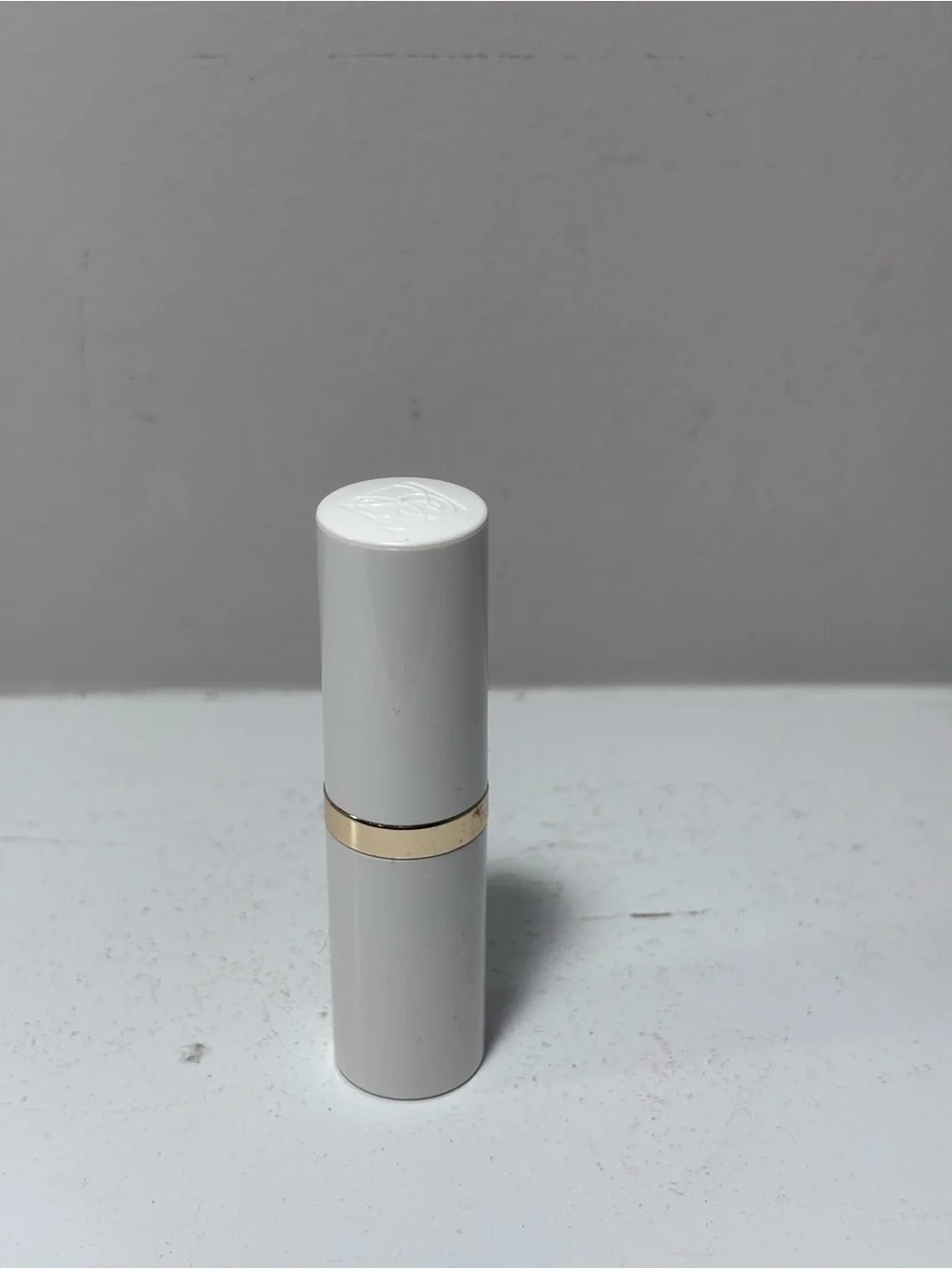 Estée Lauder Lip Conditioner Lipstick .13 Fl Oz - White Tube with Gold Accent